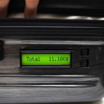 Дорожный чемодан со встроенными весами